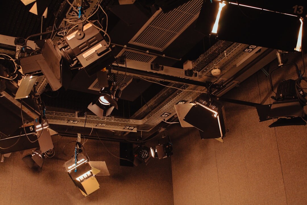 Television anchor desk set with cameras and lighting rig